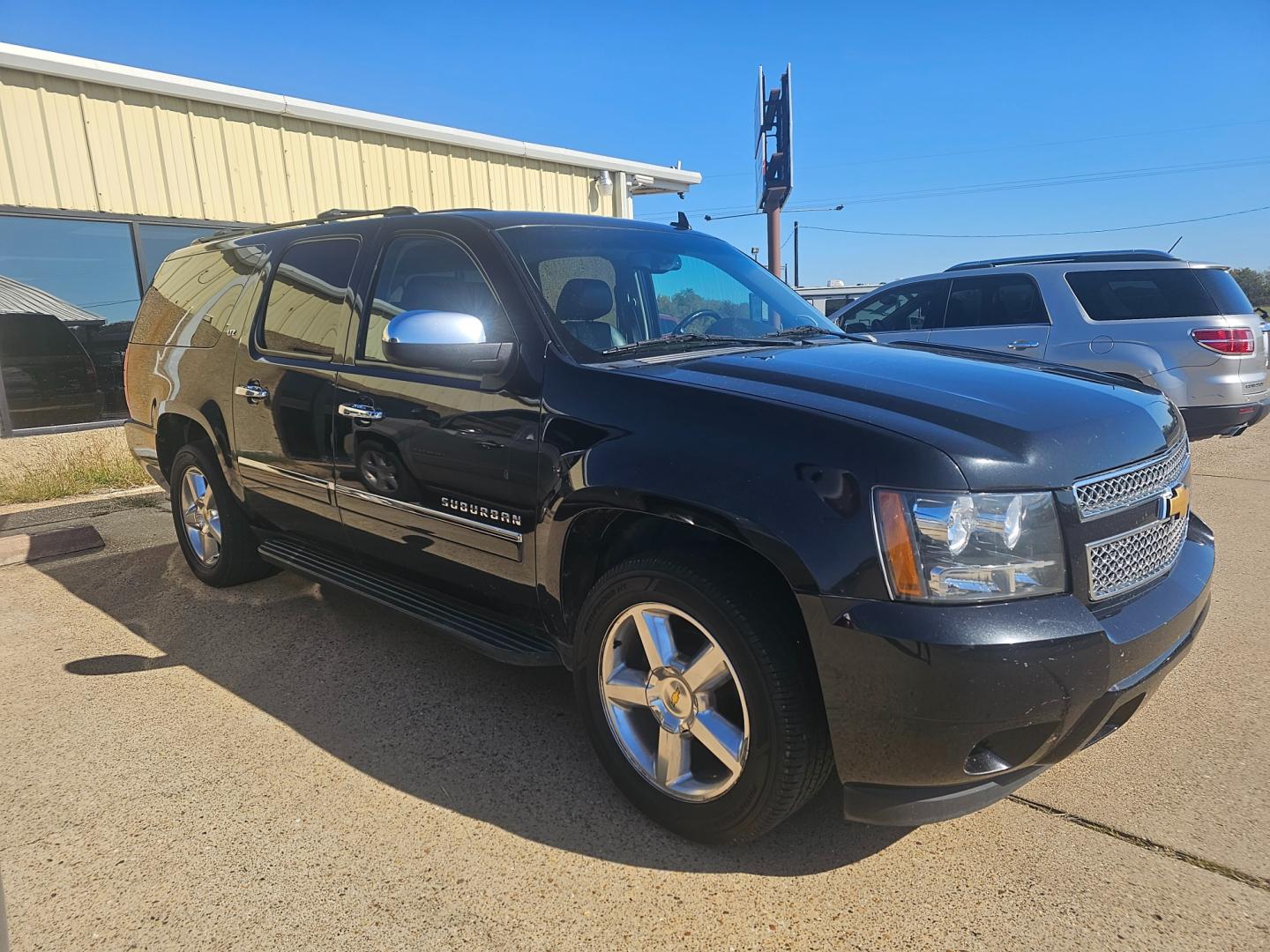 2012 BLACK Chevrolet Suburban LTZ 1500 (1GNSCKE0XCR) with an 5.3L V8 OHV 16V FFV engine, 6-Speed Automatic transmission, located at 533 S Seven Points BLVD, Seven Points, TX, 75143, (430) 255-4030, 32.313999, -96.209351 - Photo#1